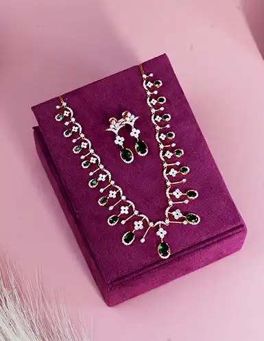 Ruby and pearl bridal necklace set with diamond-studded earrings